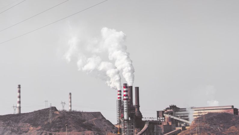 Air Quality - smoke comes out from industrial factory chimney