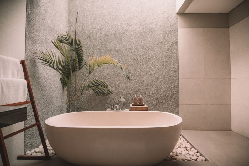 Bathroom Gadgets - white ceramic bathtub