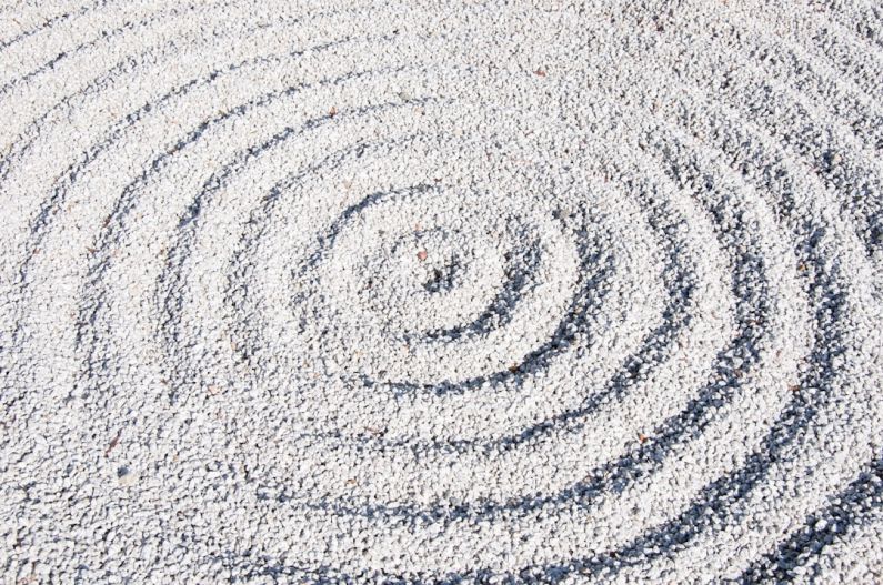 Zen Garden - a circular design made of sand on a beach