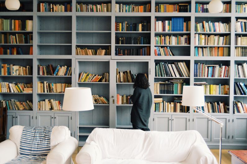 Book Storage - woman finding some book to read